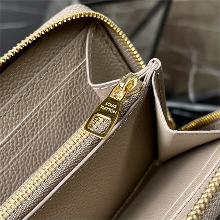 LV  Clémence Wallet Monogram Empreinte Leather Tourterelle M82338