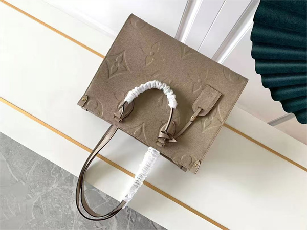 L.V ONTHEGO MM Monogram Empreinte Leather Turtledove M45607